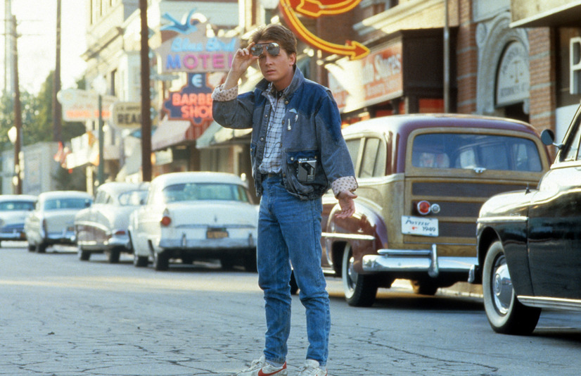 Michael J Fox In 'Back To The Future'Michael J Fox walking across the street in a scene from the film 'Back To The Future', 1985. (Photo by Universal/Getty Images)　（C）Getty Images