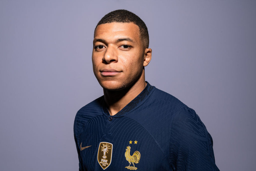 France Portraits - FIFA World Cup Qatar 2022DOHA, QATAR - NOVEMBER 17: (EDITORS NOTE: Image has been digitally retouched) Kylian Mbappe of France pose during the official FIFA World Cup Qatar 2022 portrait session at on November 17, 2022 in Doha, Qatar. (Photo by Michael Regan - FIFA/FIFA via Getty Images)