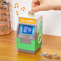 「一番くじ どうぶつの森 おかえり！ハッピーメモリーズ」B賞：タヌポートATM型貯金箱（サウンド付）　使用イメージ