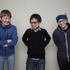 左から、キャラクターデザイン・吉田健一、総監督・京田知己、脚本・佐藤大