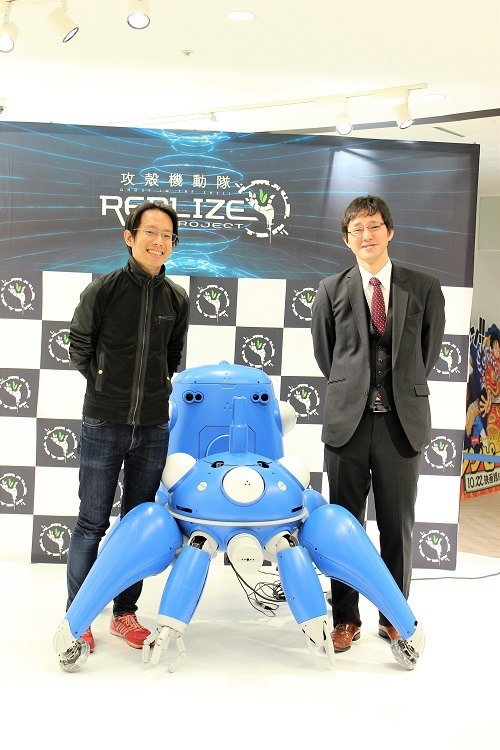 タチコマが実機で接客、スマホアプリと連携した「商品受け渡しサービス」がI.Gストアにて開始