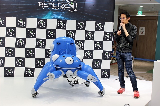 タチコマが実機で接客、スマホアプリと連携した「商品受け渡しサービス」がI.Gストアにて開始