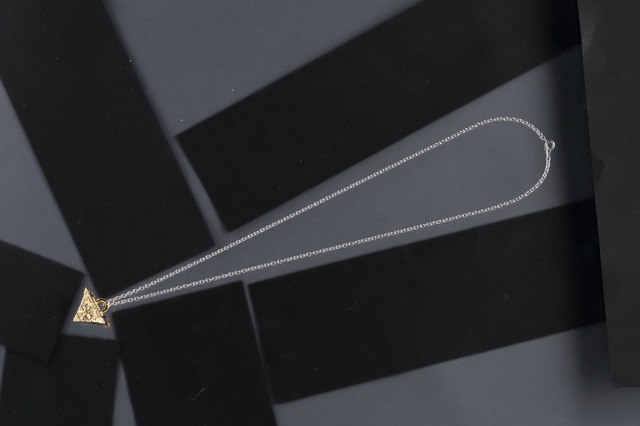 『遊☆戯☆王』 千年パズルネックレス 12,000 円(税込) ※シリアルナンバー入り (C)高橋和希 スタジオ・ダイス／集英社