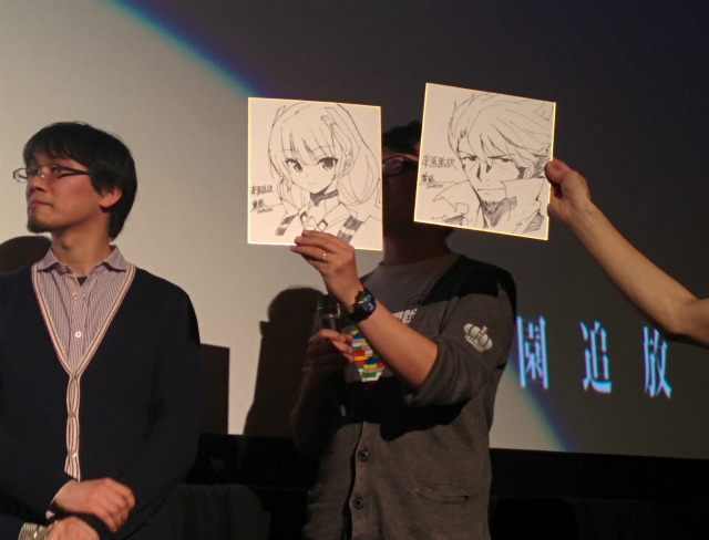 その場で描き下ろされたアンジェラとディンゴの色紙がプレゼントされた